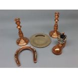 Pair of copper knopped columned 7" candlesticks, together with a further copper horseshoe