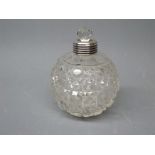 Spherical cut glass scent bottle with silver mount, complete with glass stopper (but lacking lid)