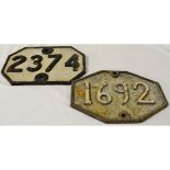 Two cast iron locomotive number plates, 1692 and 2374