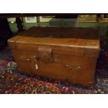 Good quality tan leather travelling trunk with heavy leather side handles and impressed initials "