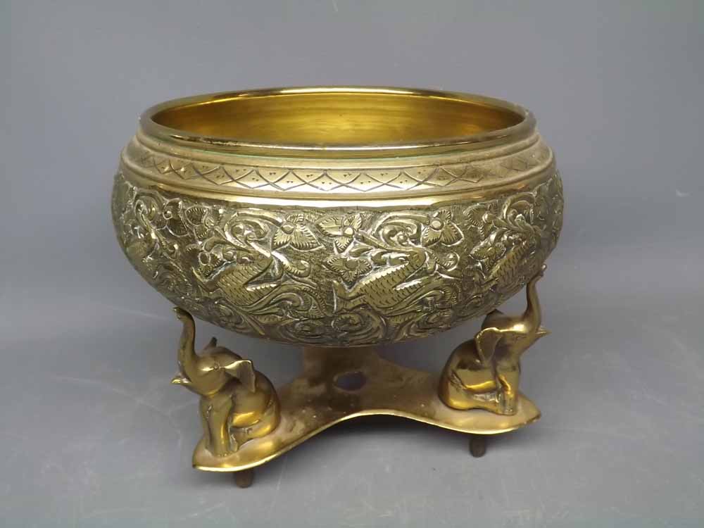 Indian brass bowl, raised on three elephant shaped supports