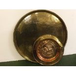 Pressed brass and coppered 15" dish, depicting George and the Dragon; together with a further 25"