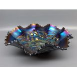 Blue carnival glass crimped edge dish with impressed strawberries, 9" diameter