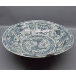 Blue and white provincial Ming charger, possibly painted by a scholar, with decorative floral