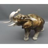 Czechoslovakian Royal Dux model of a charging elephant measuring 10" tall