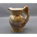 1937 Coronation jug by Bewley Pottery with lion handle and raised Coronation carriage and horses, 8"