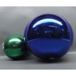 Large blue glass Witches ball together with a small green example, largest approx 10" diameter