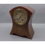 Edwardian mahogany mantel clock with waisted sides and inlaid front panel, enamel dial, 10" tall