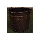 Large copper riveted circular milk pail with etched scene of a Dutch milkmaid, 12" high x 13"