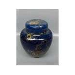 George Jones bulbous ginger jar decorated with gilded foliage on a blue ground, 8" tall