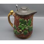 Minton Majolica jug with pewter lid formed as an oak tree with impressed mark to base, 7 1/2" tall