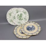 Pair of 19th century green and white glazed Don Quixote plates, 9" diameter, together with a pair of