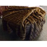 Faux fur striped brown lined rug