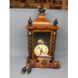 19th century walnut Vienna wall clock, with half turned and fluted columns with finial supports with