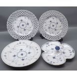 Pair of blue and white ribbon edge Copenhagen plates together with a further larger example, and