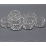 Set of eight cut glass napkin rings