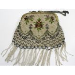 Early 20th century bead work evening purse, intricate flower and swag decoration terminating in long