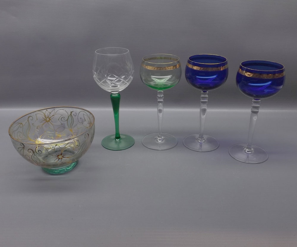 Three coloured glass and gilded hock glasses, with clear stems, together with non-matching glass and