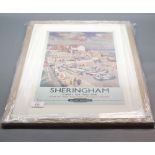 Pine framed reproduction British Railway advertising print of Sheringham, 23" x 17"