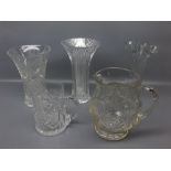 Three 19th/20th century glass vases, of fluted form, one with crimped edge, together with a