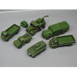 Collection of seven Dinky military vehicles: Scammel recovery truck Model No 661, AEC armoured