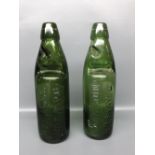 Two dark green glass Codd bottles, Dawson's Norwich, height 9" (2)