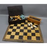 Boxed set of Staunton pattern carved chess pieces together with a matching set of draught pieces and