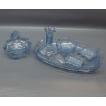 20th century blue glass part dressing table set, comprising single candle stick, tray, lidded
