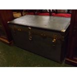 Mid-20th century shipping trunk, of typical hinged rectangular form, and fitted with hinged and