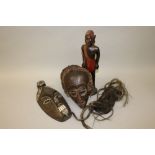 Three African masks and a figure (4)