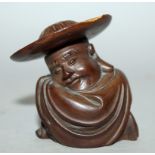 Small C19th / C20th Japanese wood okimono, carved in the form of a sleeping sage in a wide brimmed