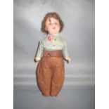 Small German doll, makers name stamped on back of head. dated 1909-1915.