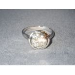 Large diamond solitaire ring in white precious metal probably platinum, size M