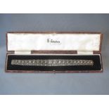 Impressive cased antique diamond bracelet, approx. 10-15cts, set in white precious metal