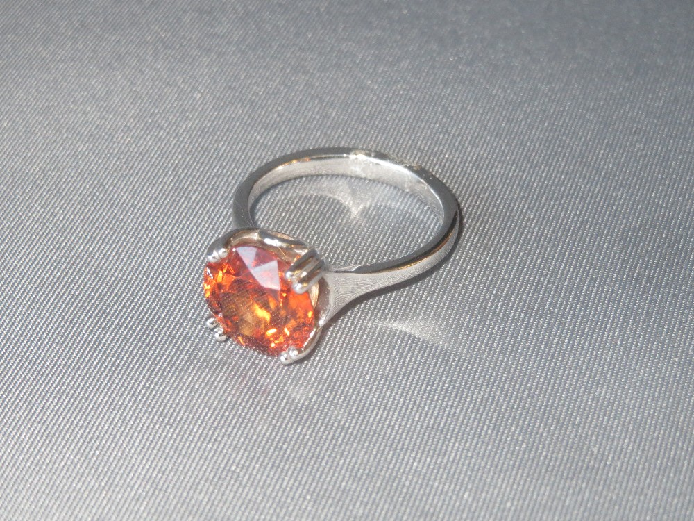 18ct white gold orange zircon ring, size M