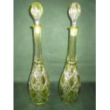 Pair of Bohemian green tinted cut glass slender decanters and stopper 45 cm H