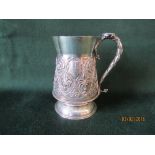 Victorian silver mug, the body chased "ERVI" with coronet flanked by armorials, fleur de leys and