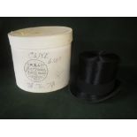 Black silk top hat by Henry Heath of London in a cardboard hat box by Lock & Co. approx 7 1/8