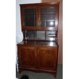 Victorian mahogany glazed fronted bookcase with cupboard base on bracket feet