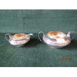 George III silver milk jug and twin handled sugar bowl, London 1825...