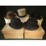 3 black bowler hats, grey top hat and Trilby in hat boxes
