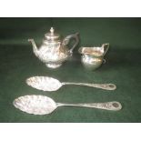 C19th Continental silver bachelors tea pot, pair silver berry spoons and silver cream jug 15ozt