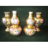 Pair of Dresden gourd shaped gilt ground vases with floral decoration bearing Augustus Rex mark to