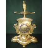 C19th Century French Ormolu mantel clock with blue enamel roman numerals to an 8 day movement on