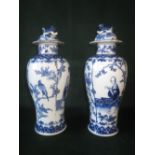 Pair of late C19th Chinese baluster vases and covers painted in underglaze blue, 4 painted character