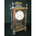 French Champleve enamel and onyx mantel clock with a twin train movement and mercury bob pendulum