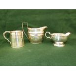 Two hallmarked silver cream jugs, and silver tankard by TA of London 12 ozt