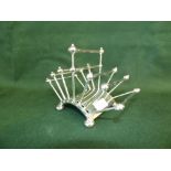 Late Victorian silver plated 6 division toastrack designed by Christopher Dresser for Hukin and