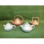 Four C20th Chinese Yixing teapots and covers, 15.5cm long max. (4)