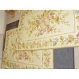 Similar pair of Aubusson style rugs, with all over cream background with floral green and pink